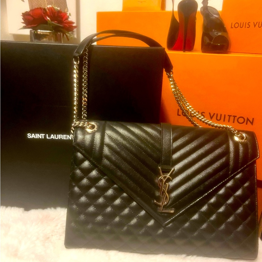 Gorgeous Black YSL purse medium size. Great looks for all occasions!